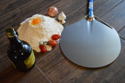 Aluminum pizza shovel. GI. Round 36cm / 150cm